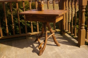 Front view of Barn Siding Table with apple wood legs